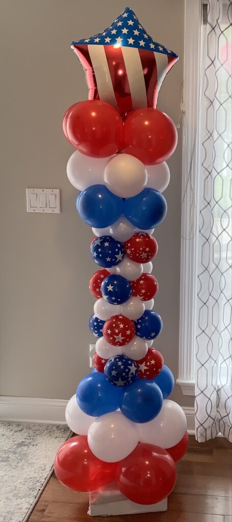 red whit and blue balloon topiary